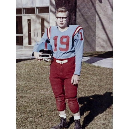 Old Time Football Player - Fifteen year old high school football player portrait outside the school, ca. 1961 Print Wall Art