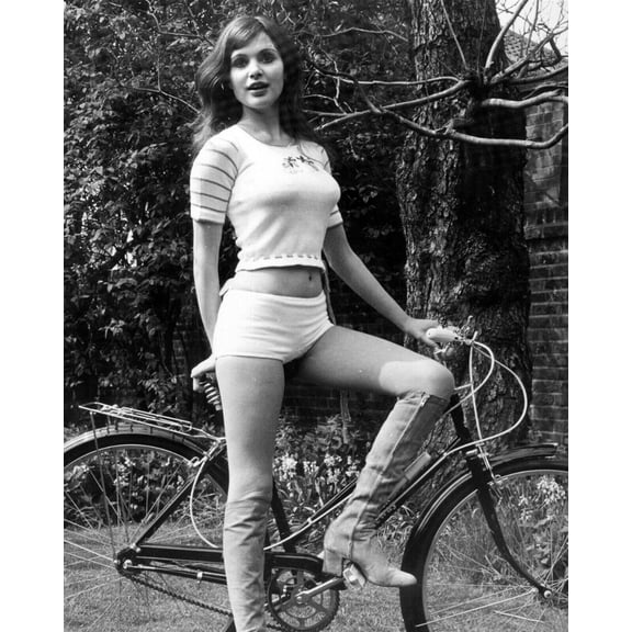 Madeline Smith huge bust bare midriff white hot pants & boots 8x10 inch photo