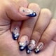 thumbnail image 1 of Uñas postizas medianas almendradas con puntas francesas azules y diseño floral blanco, juego de 24 piezas., 1 of 4
