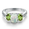 thumbnail image 3 of Gem Stone King 2.00 Cttw White Opal and Green Peridot Filigree Style 3-Stone Ring for Women | 925 Sterling Silver | Oval 8X6MM and 6X4MM | Three Stone Wedding Engagement Anniversary Ring | Size 9, 3 of 6