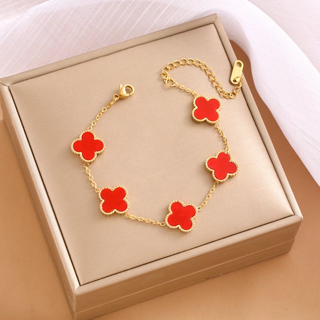 Pulsera de trébol de acero de titanio europea y americana con incrustaciones de concha, pulsera con colgante, pulsera de diseño avanzado que no se decolora