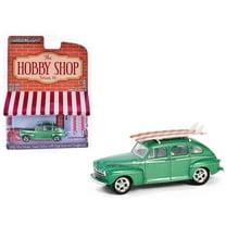 1946 Ford Fordor Super Deluxe Green Metallic with White Interior and Rack with Surfboards 1/64 Diecast Model Car by Greenlight