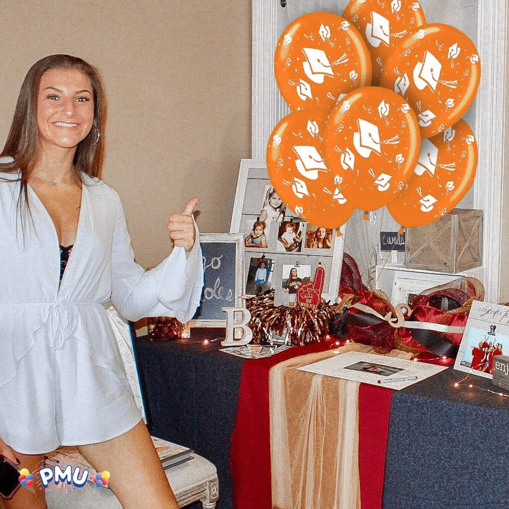 PMU 100 Pcs Graduation Balloons PartyTex 11 inch Premium Orange with All-Over Print White Grad Caps-Confetti and Streamers Graduation Party Decorations