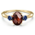 thumbnail image 3 of Gem Stone King 10K Yellow Gold Red Garnet and Blue Created Sapphire 3-Stone Ring for Women | 1.81 Cttw | Oval Checkerboard 8X6MM | Gemstone January Birthstone | Size 7, 3 of 6