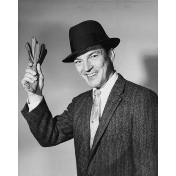 Mid adult man holding a pair of gloves Canvas Art - (18 x 24)