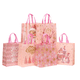 thumbnail image 1 of Bolsas de regalo impermeables, no tejidas, rosas, para Navidad, 24 unidades, 1 of 5