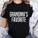 thumbnail image 1 of Camiseta 100% Algodón "La Favorita de la Abuela" para Mujer - Diseño Divertido, Regalo de Amor Familiar para Mamá, Papá o Abuela, 1 of 7