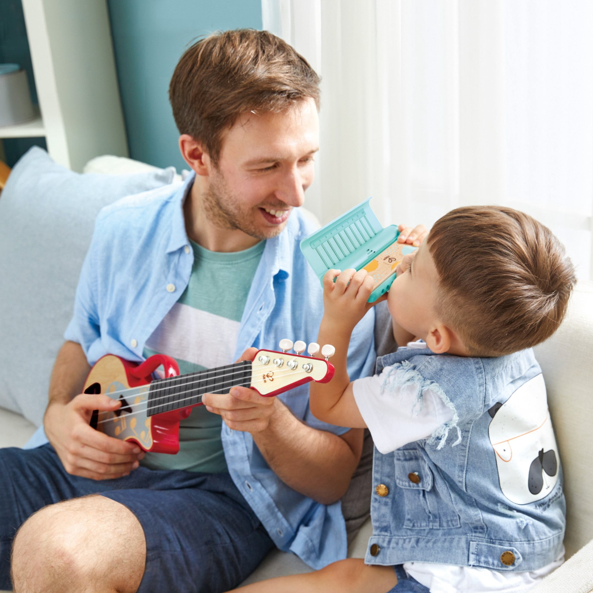 Hape Learn With Lights Kids Harmonica in Teal W/ USB Charging Capabilities