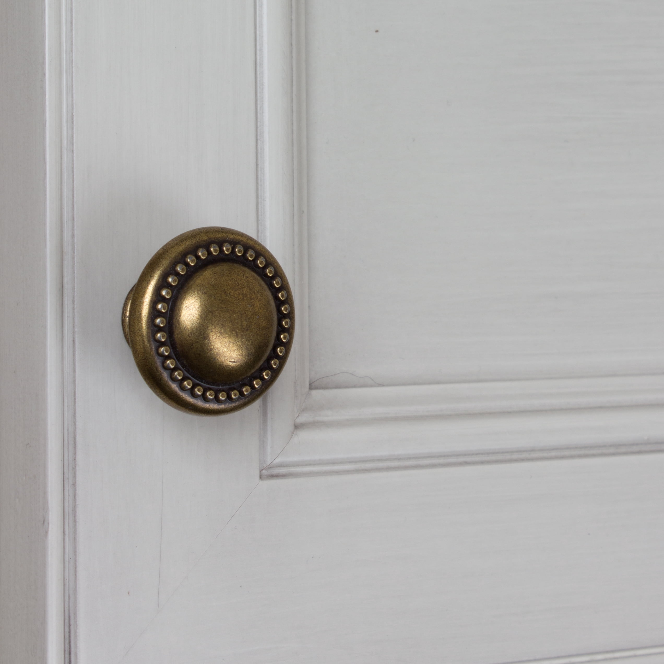 GlideRite 1.25 in. Round Beaded Cabinet Knobs, Antique Brass, Pack of 10