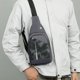 thumbnail image 4 of Mochila de hombro para hombre en el pecho - Bolso cruzado impermeable de nylon resistente con bolsillo antirrobo | Correas ajustables 35-50in | Encaja en tabletas de 7,9 pulgadas | 30x17x5cm | 1 Pack, 4 of 6