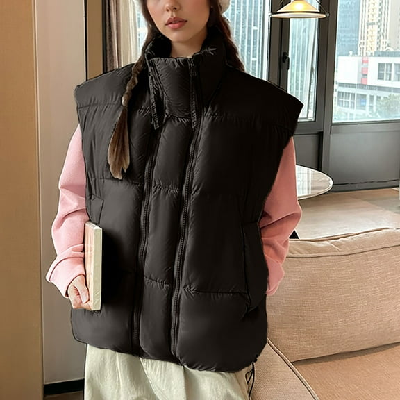 Fanxing Women's Oversized Puffer Vest Lightweight Warm Sleeveless Puffy Bubble Outerwear Jackets Coats with Pockets Black M