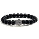 thumbnail image 1 of Pulsera con dije de huella de pata de piedra volcánica de lava negra mate natural, ideal como recuerdo para mascotas, amantes de los gatos y los perros., 1 of 2