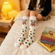 thumbnail image 4 of Calcetines navideños de polar hasta la rodilla para mujer | Forro polar coral extra grueso y cálido | Medias festivas con estampados de Papá Noel, muñeco de nieve y reno | Medias de invierno, 4 of 5