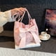 thumbnail image 4 of Bolso de hombro de lona de mujer con lazo - correa ajustable, bolsa espaciosa para uso diario y viajes en rosa, negro y blanco, 4 of 6
