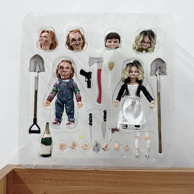 NECA Bride of Chucky Figures Ultimate Chucky y Tiffany Character Lucky PVC Figuras de acción Juguete de terror Regalo de Halloweencon caja zhangmengya unisex
