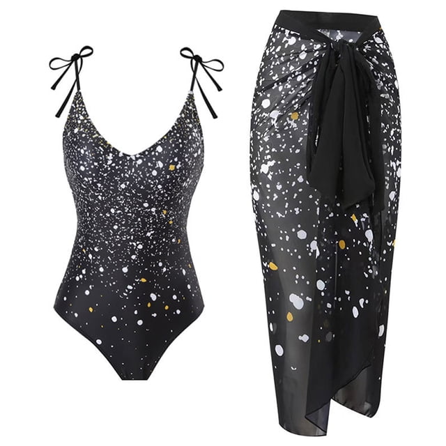 Un traje de baño de playa de aguas termales delgado de una pieza con lunares negros para mujer con falda cruzada