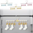 thumbnail image 1 of Baby Sock Drying Hanger | 8-Pin Rotatable Clothes Clip | Plastic Sock Holder for Laundry Organization | Yellow, Pink, Light Blue Color Options, 1 of 6