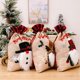 thumbnail image 5 of Bolsa de regalo de 3 piezas para la nueva decoración navideña, muñeco de nieve viejo, ciervo, lino a cuadros, bolsa de regalo para el ambiente festivo, suministros de decoración., 5 of 5