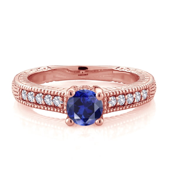 Gem Stone King 18K Rose Gold Plated Silver Blue Created Sapphire and White Created Sapphire Women's Solitaire Ring with Accent Stones (0.75 Cttw, Round Shape 5MM, Size 9)