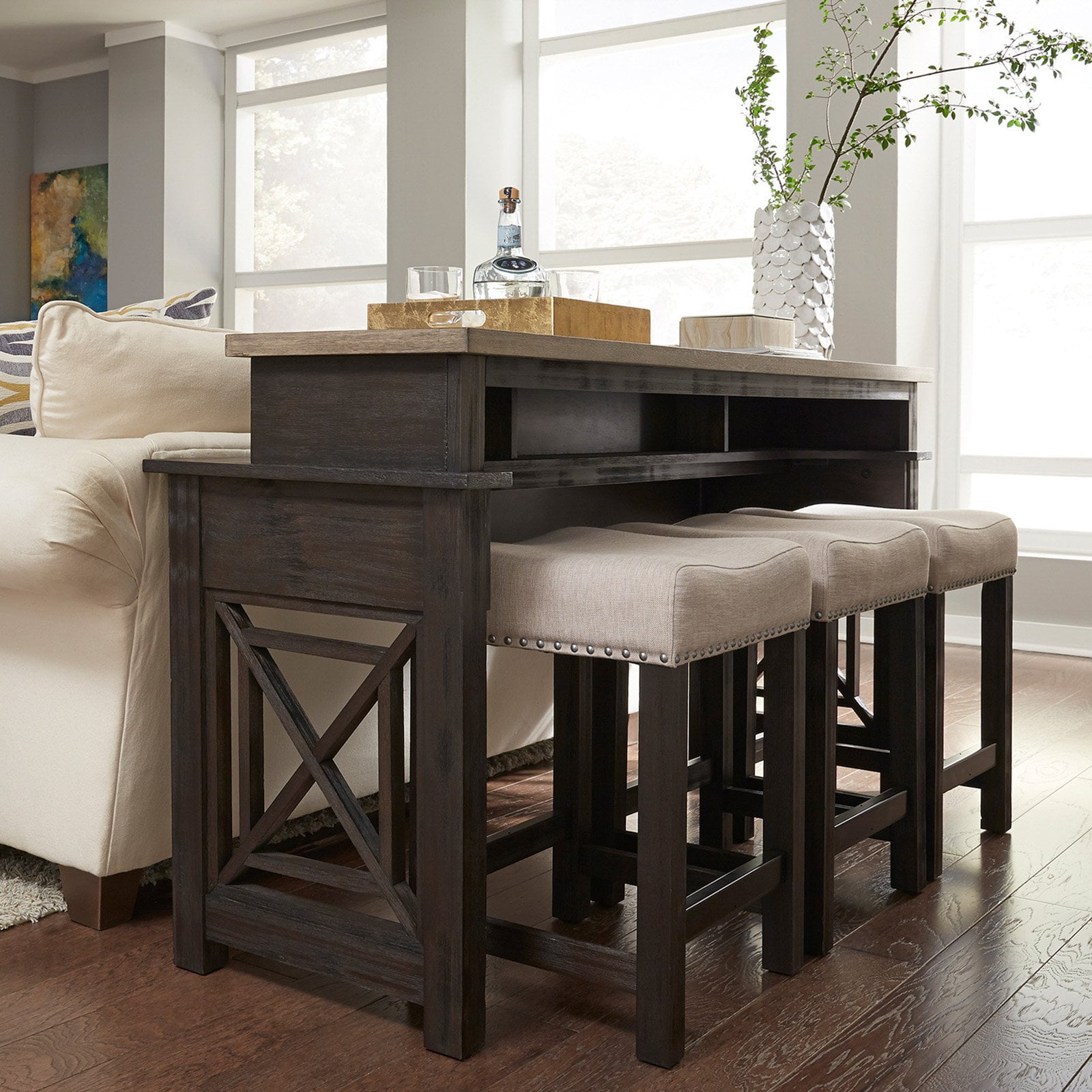 table behind couch with stools