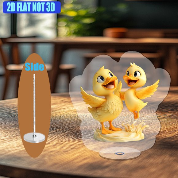 A rotating acrylic display features playful yellow ducks with detailed feathers and cheerful expressions frolicking by a lake in a whimsical setting