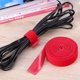 thumbnail image 5 of 2 bridas adhesivas reutilizables de 100 cm con cierre de velcro para cables, ideales para el hogar, la oficina, la tableta, el televisor, la electrónica y la gestión de cables (rojas)., 5 of 7