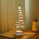 thumbnail image 5 of Lámpara de mesa con forma de árbol de Navidad. Lámpara de mesa con forma de árbol de Navidad a pilas, 30 LED, brillante y segura, luz cálida dorada para dormitorio o escalera (Navidad, Blanco cálido)., 5 of 6