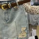 thumbnail image 5 of Dongdaemun2024 Verano Nuevo Vintage Desgastado Agujero Denim Mini Vestido De Mujer De Cintura Alta Adelgazante Glúteos Levantamiento De Glúteos Falda A-Line, 5 of 5
