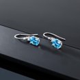 thumbnail image 5 of Gem Stone King 10K White Gold Swiss Blue Topaz and White Created Sapphire Dangle Earrings for Women (2.70 Cttw, Gemstone Birthstone, Oval 8x6mm), 5 of 5