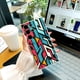 thumbnail image 3 of Eleva el estilo y la durabilidad de tu iPhone con esta moderna y versátil funda de goma TPU a prueba de golpes para teléfono, que presenta un diseño de dibujos animados elegante y creativo., 3 of 4