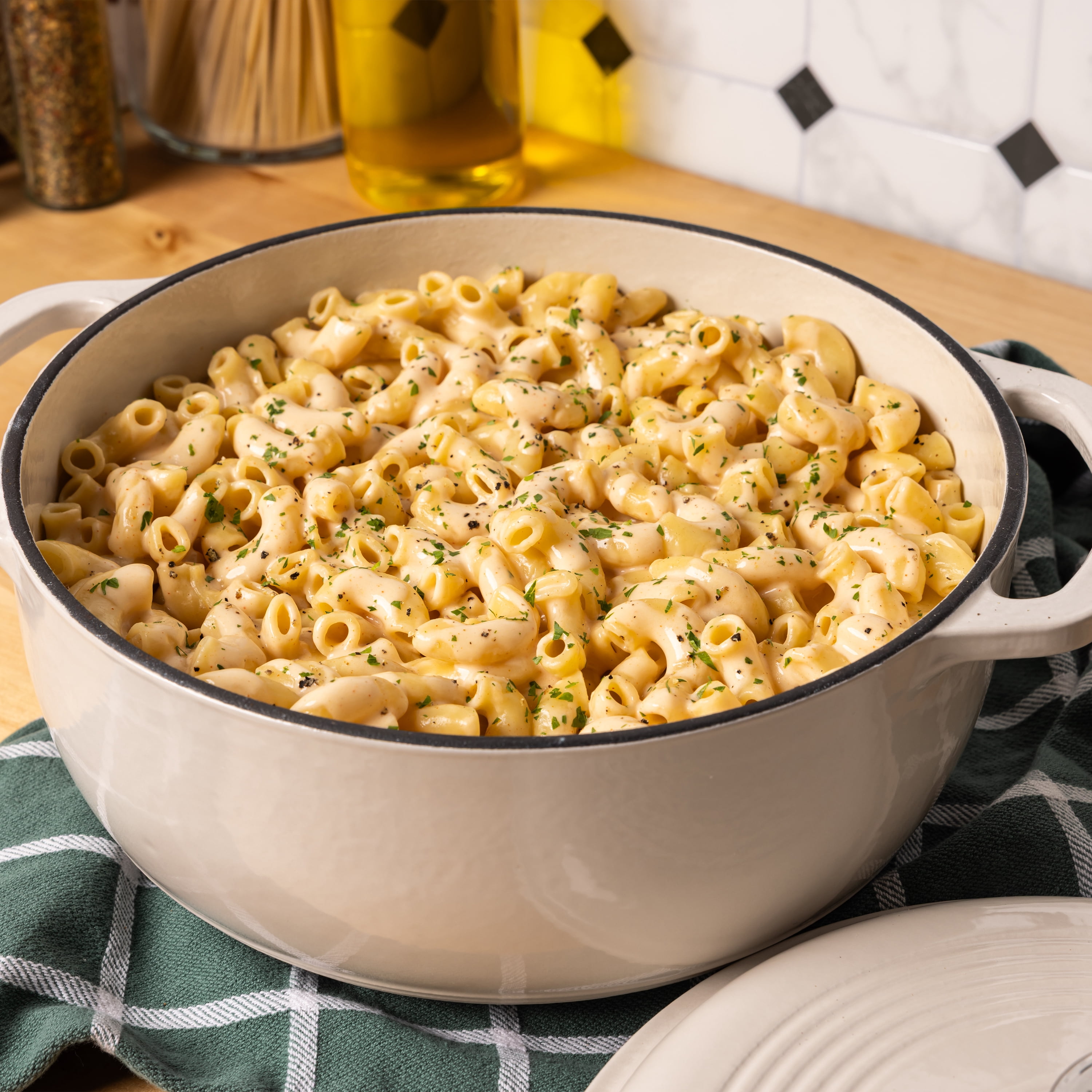Lodge 4.5 Quart Enameled Cast Iron Dutch Oven with Lid – Dual Handles – Oven Safe up to 500° F or on Stovetop - Use to Marinate, Cook, Bake, Refrigerate and Serve – Oyster