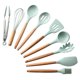 thumbnail image 1 of Juego de 9 utensilios de cocina en silicona con mangos de madera verde, ideal para cocinas modernas y seguras., 1 of 7