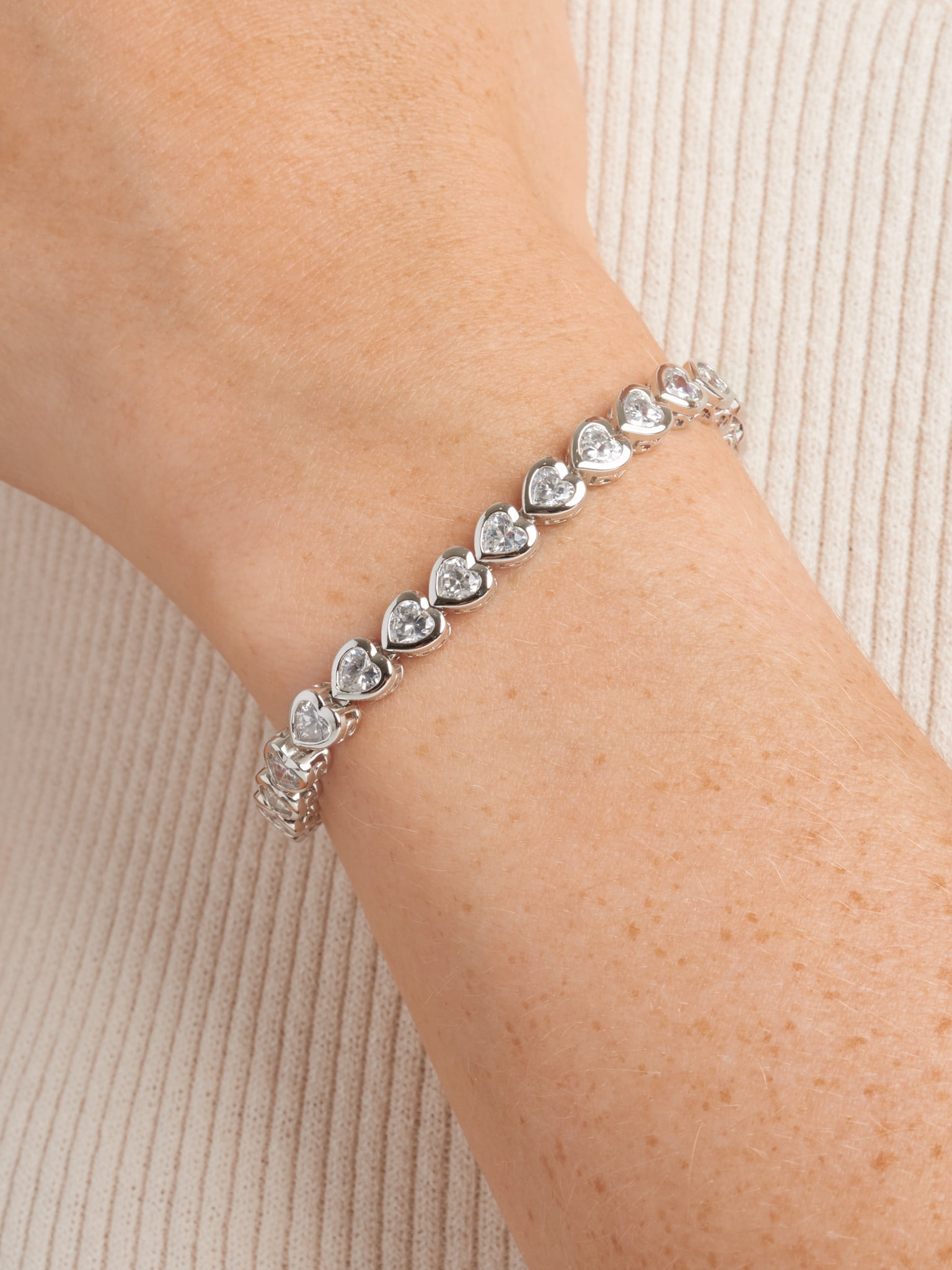 Sterling Silver Platinum Plated 4mm CZ Heart 7.25" 'Tennis Bracelet.with box Clasp