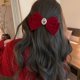 thumbnail image 2 of Pinza para el pelo ZHAOCHENG con forma de lazo de terciopelo color rojo, 2 of 3