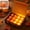 A, variant on 12 Pack Halloween Pumpkin LED Tea Lights, Flickering Flameless Jack O Lantern Electronic Candle Tabletop Party Decor Lights