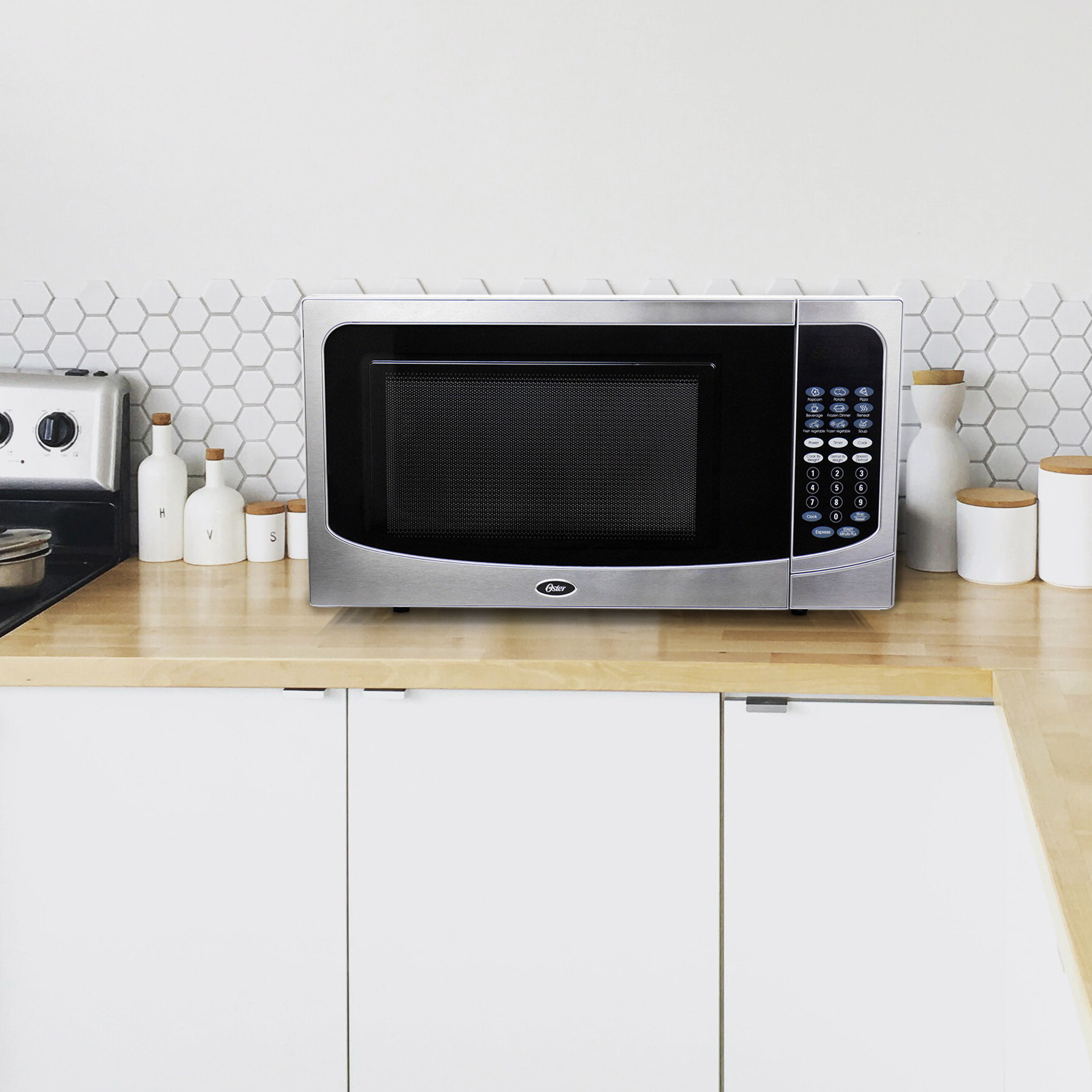 Oster 0.7 CuFt Digital Microwave Ove…, Appliances