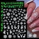 thumbnail image 1 of hojas de pegatinas navideñas para decoración de uñas, calcomanías luminosas 3D para decoración de uñas navideñas, diseños autoadhesivos para uñas, copos de nieve navideños, muñeco de nieve, alce, Pap, 1 of 4