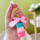 thumbnail image 1 of Llavero creativo con forma de pastel de macarrones, exquisito y lindo bolso de pareja, colgante pequeño, colgante pequeño de coche de moda, 1 of 2