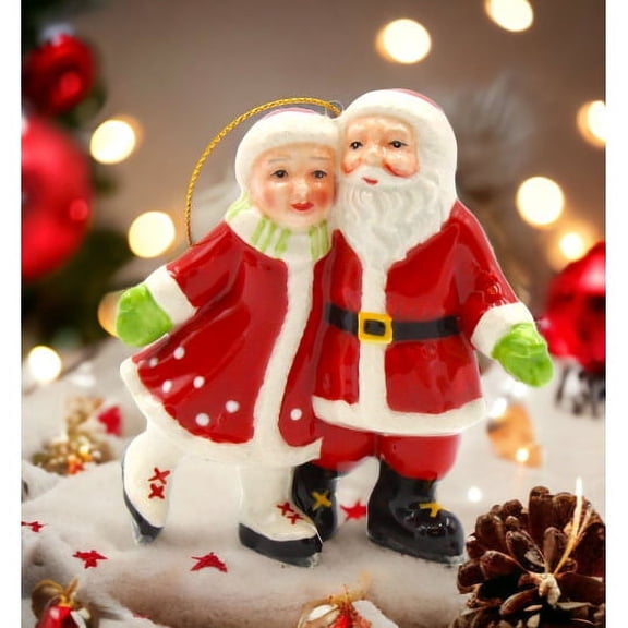 Ceramic Santa and Mrs Claus Ice Skating Ornament 3.625 x 1.5 x 4