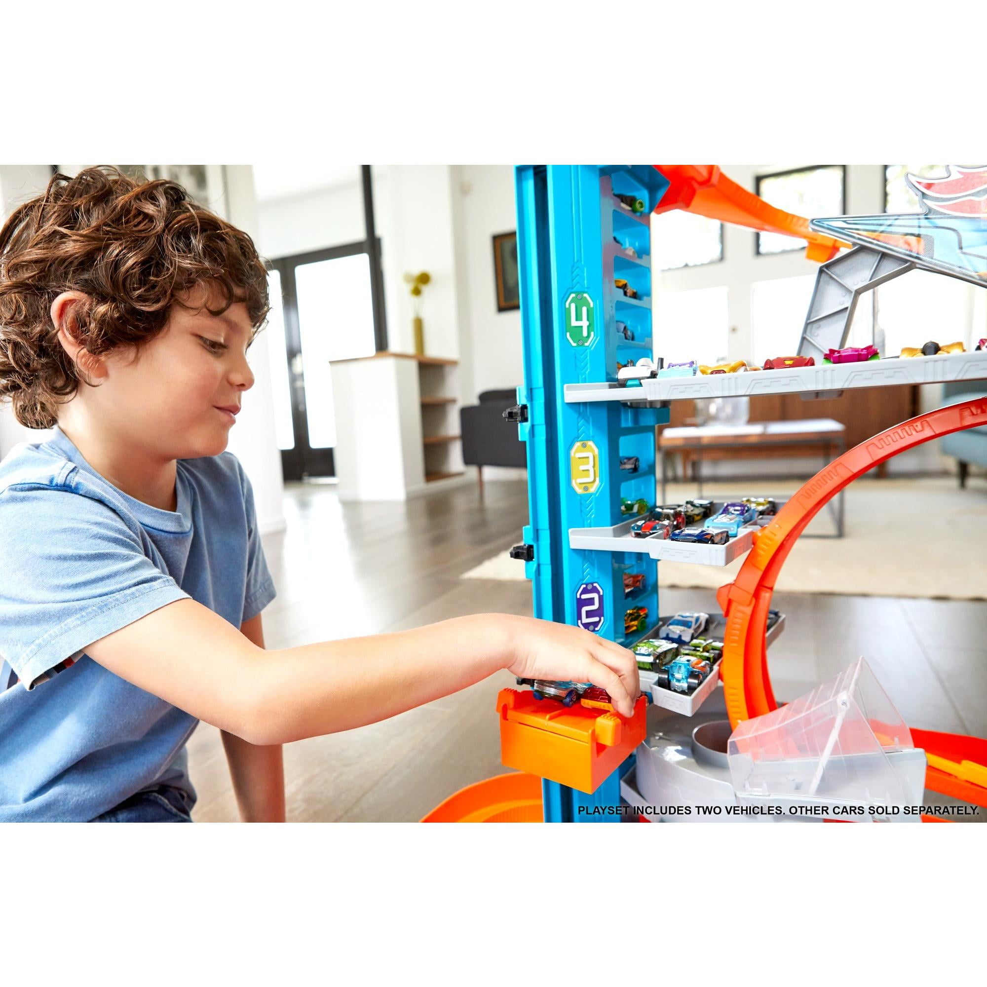 hot wheels ultimate garage tower shark loop racetrack set with two vehicles