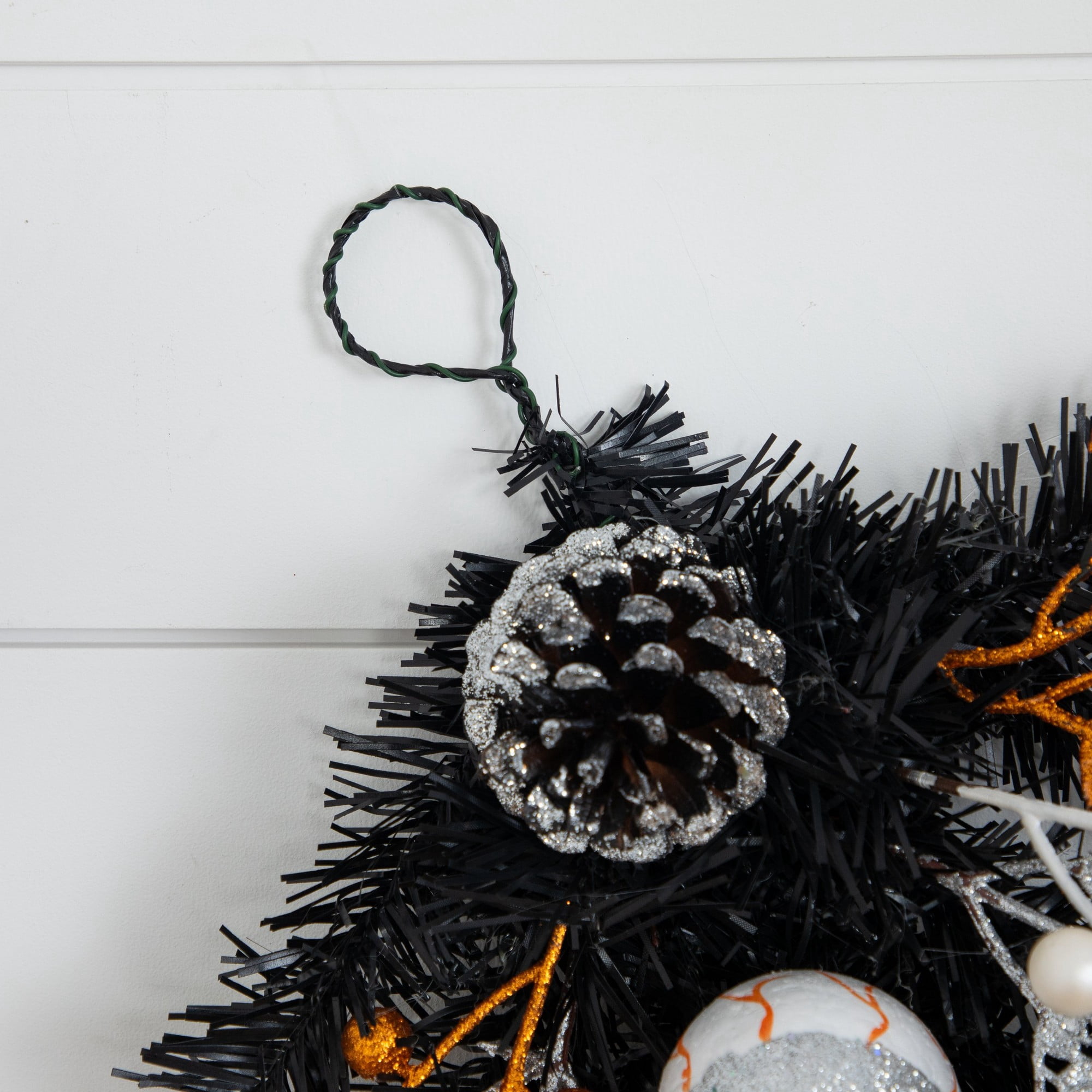 6ft. Artificial Halloween Black Garland with Skulls, Eyeballs and Spiders