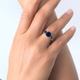 thumbnail image 5 of Gem Stone King 18K Yellow Gold Plated Silver Blue Created Sapphire 3 Stone Engagement Ring for Women (3.70 Cttw, Gemstone September Birthstone, Cushion 8MM, Size 7), 5 of 5