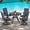Black Table/Blue Chairs, variant on Zidtia 5 Piece Patio Dining Set for 4, 42” Round Metal Table with Umbrella Hole & 4 Swivel Chairs, All Weather Outdoor Patio Furniture Set