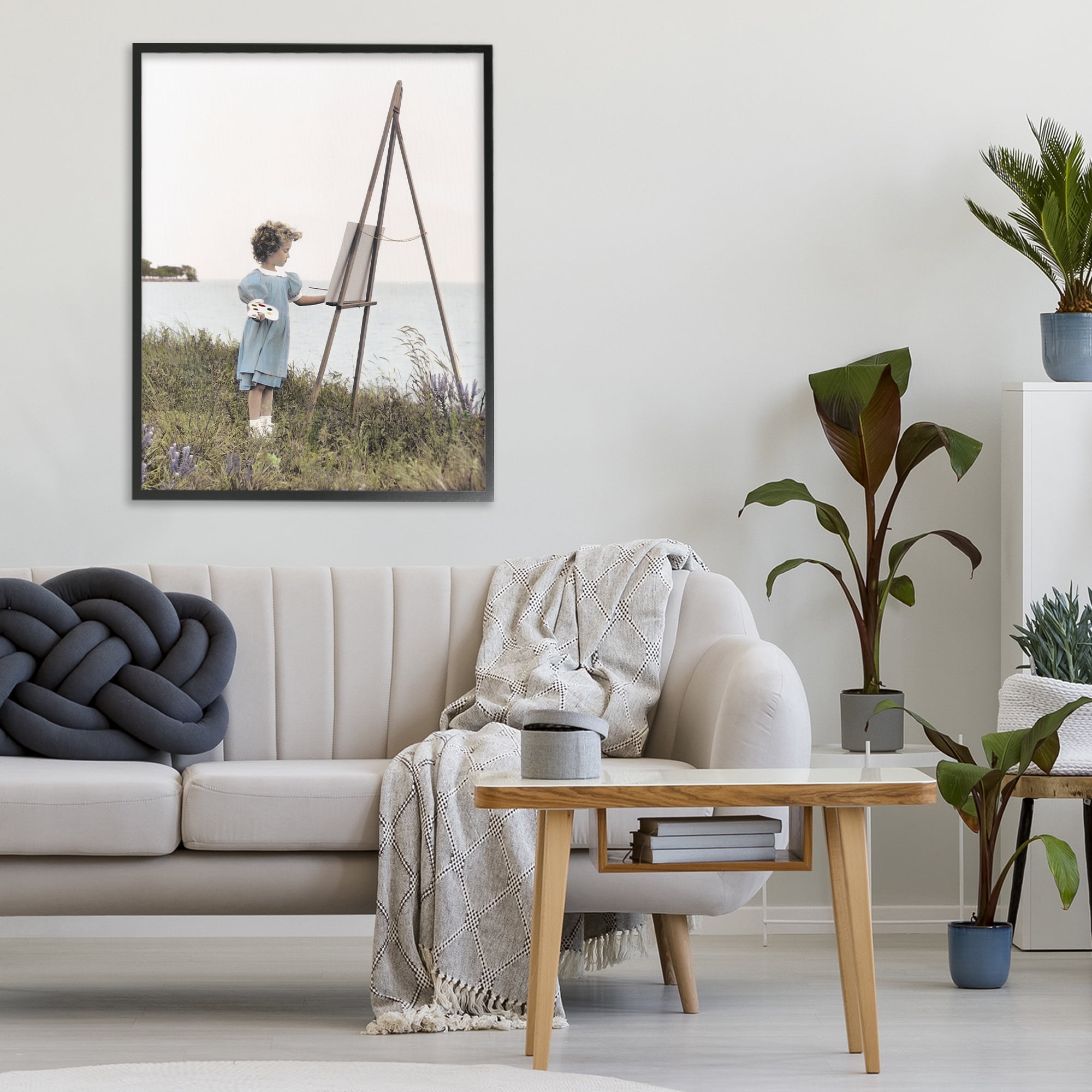 Stupell Industries Child Painting on Easel Black Framed Giclee Art, design by Kendra Dew