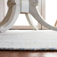 thumbnail image 4 of SAFAVIEH Braided Lyla Solid Polyester Reversible Area Rug, Ivory/Light Blue, 4' x 4' Round, 4 of 11