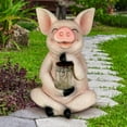 thumbnail image 3 of Exhart Solar Pig Garden Statue Holding a Glass Jar with Eight LED Firefly String Lights, 7 by 10.5 inches, Resin, Multicolor, 3 of 8
