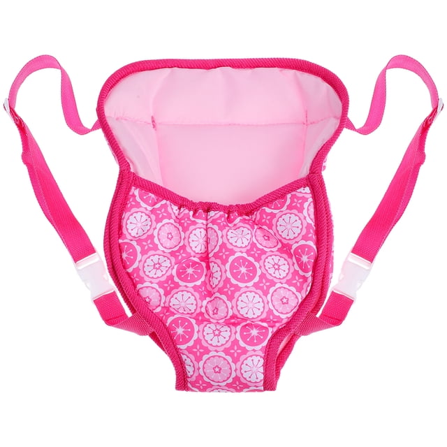 correa para muñeca de 18 pulgadas, ideal para llevarla al aire libre. incluye correa para muñeca — arnés rosa para muñeca en vista frontal, panel delantero acolchado con estampado circular blanco sobre fucsia, forro rosa claro, tirantes ajustables fucsia con hebillas plásticas blancas y costuras visibles; diseño portátil y plegable, tamaño aproximado 31 x 24 x 3 cm, adecuado para llevar muñecas al paseo o juego.