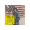 Personnel includes: Johnny Cash (vocals, guitar); Chuck Cochran (arranger); Carl Perkins, Larry McCoy, Ray Edenton (guitar); Earl Scruggs (banjo); The Oak Ridge Boys (background vocals). Producers: Johnny Cash, Charlie Bragg. Reissue producer: Al Quaglieri. Engineers: Charlie Bragg, Roger Tucker, Freeman Ramsey. Recorded in 1974. Originally released on Columbia (32917). Includes liner notes by Johnny Cash. All tracks have been digitally remastered. This is part of Columbia Records "Legacy" series. As the title track--with its martial drum intro, bold strings, and patriotic narrative--indicates, RAGGED OLD FLAG is another of the Man in Black's mid-'70s song cycles about American national identity. But while this track leans toward melodrama, the album, as a whole, is more in keeping with Cash's up-close-and-personal songwriting tradition than the elaborate history lesson of 1972's AMERICA. Here, narratives of working-class hardship predominate. "All I Do Is Drive" tells the story of a truck driver's life, while "Southern Comfort" and "King of the Hill" spin tales of jobs in a tobacco factory and a cotton mill, respectively. There are songs about alienation ("Lonesome to the Bone"), domestic bliss ("While I've Got It on My Mind"), and the anomalous but affecting environmental protest song, "Don't Go Near the Water." Cash's facility with the point-of-view story-song is strong as ever, and with rich backing from the Oak Ridge Boys and the Tennessee Three, RAGGED OLD FLAG is a worthwhile addition to any fan's collection.