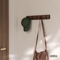thumbnail image 2 of Perchero de pared Umbra Flip con 5 ganchos abatibles, negro y nogal, 2 of 9