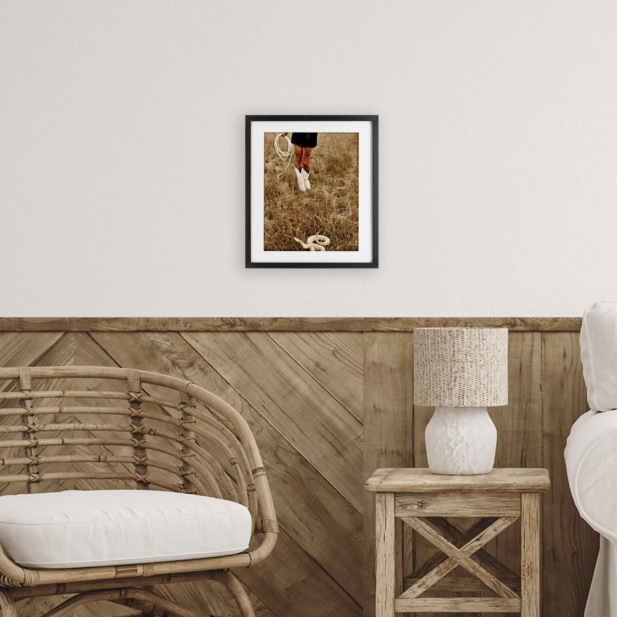 With Her Lasso & Snake Black Framed Print Under Glass, design by Jesse Keith
